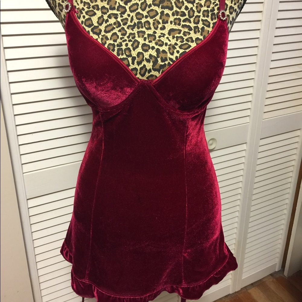 Beautiful burgundy teddy with garter straps.